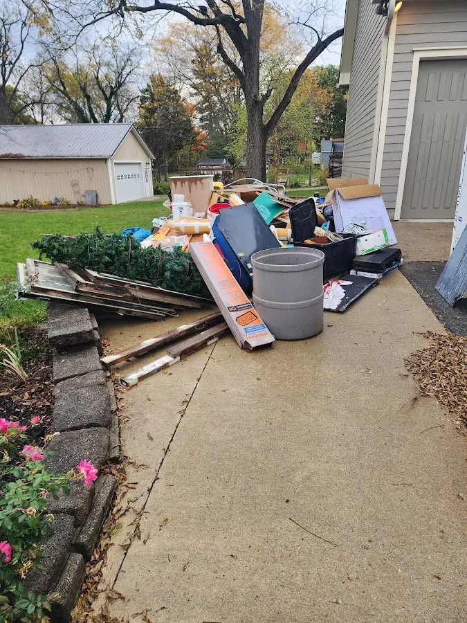 Dumpster being loaded with debris for Residential Dumpster Rental in Altavista